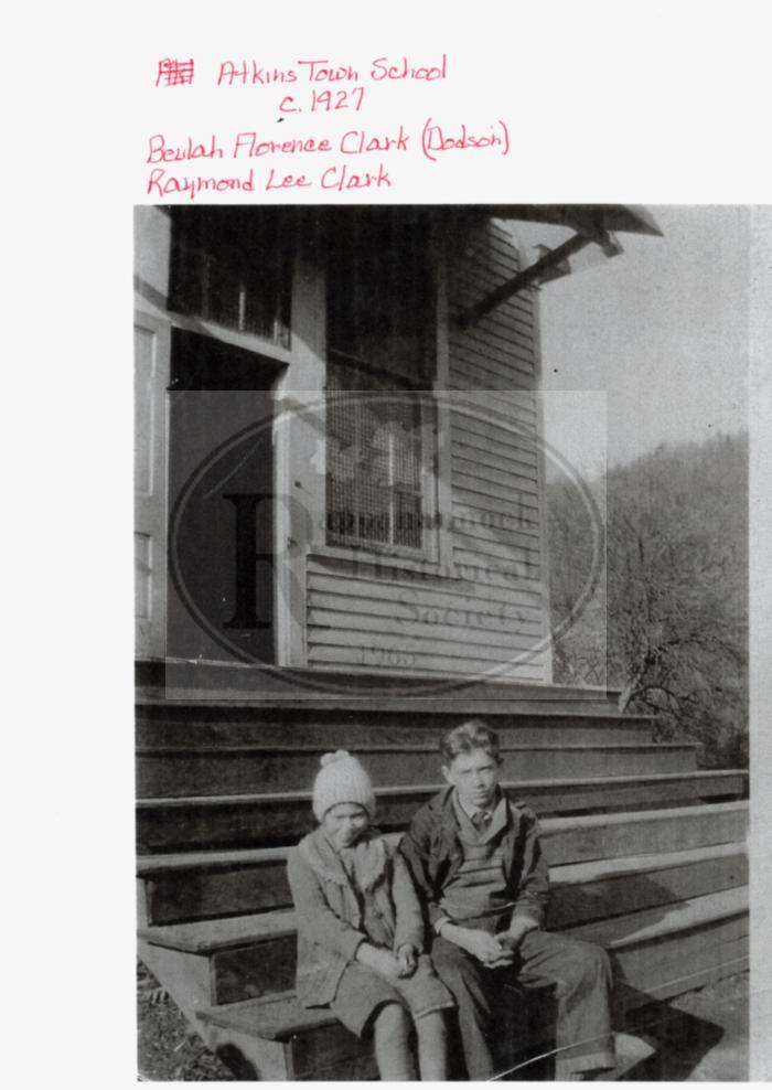 Atkinstown School:ca 1927; Beulah Florence Clark (Dodson) and Raymond Lee Clark seated on steps.